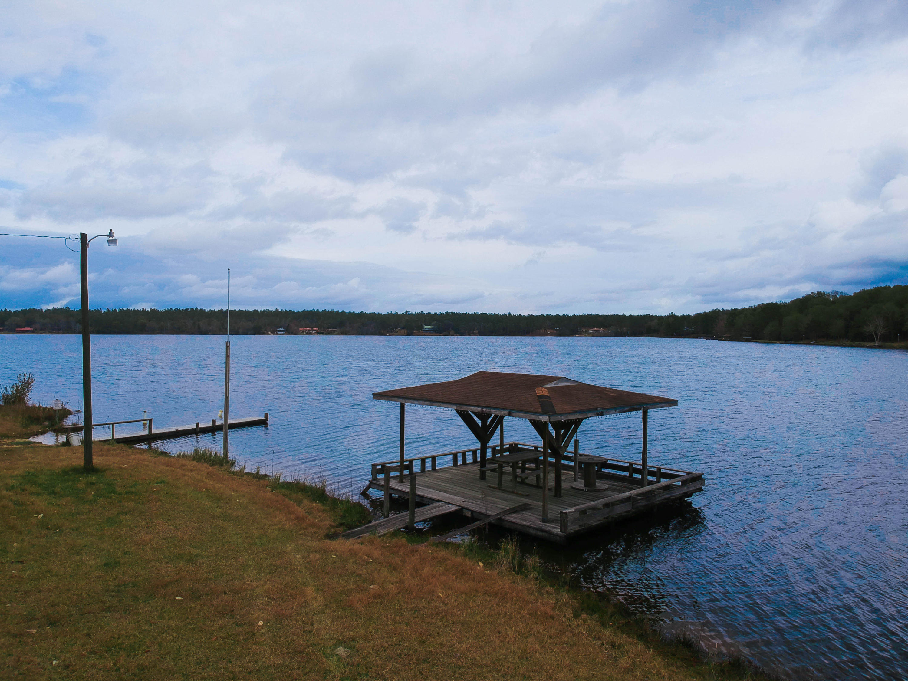 0 Spring Lake Road DeFuniak Springs, FL 32433 - Photo 15 of 16 a view of a lake with outdoor space