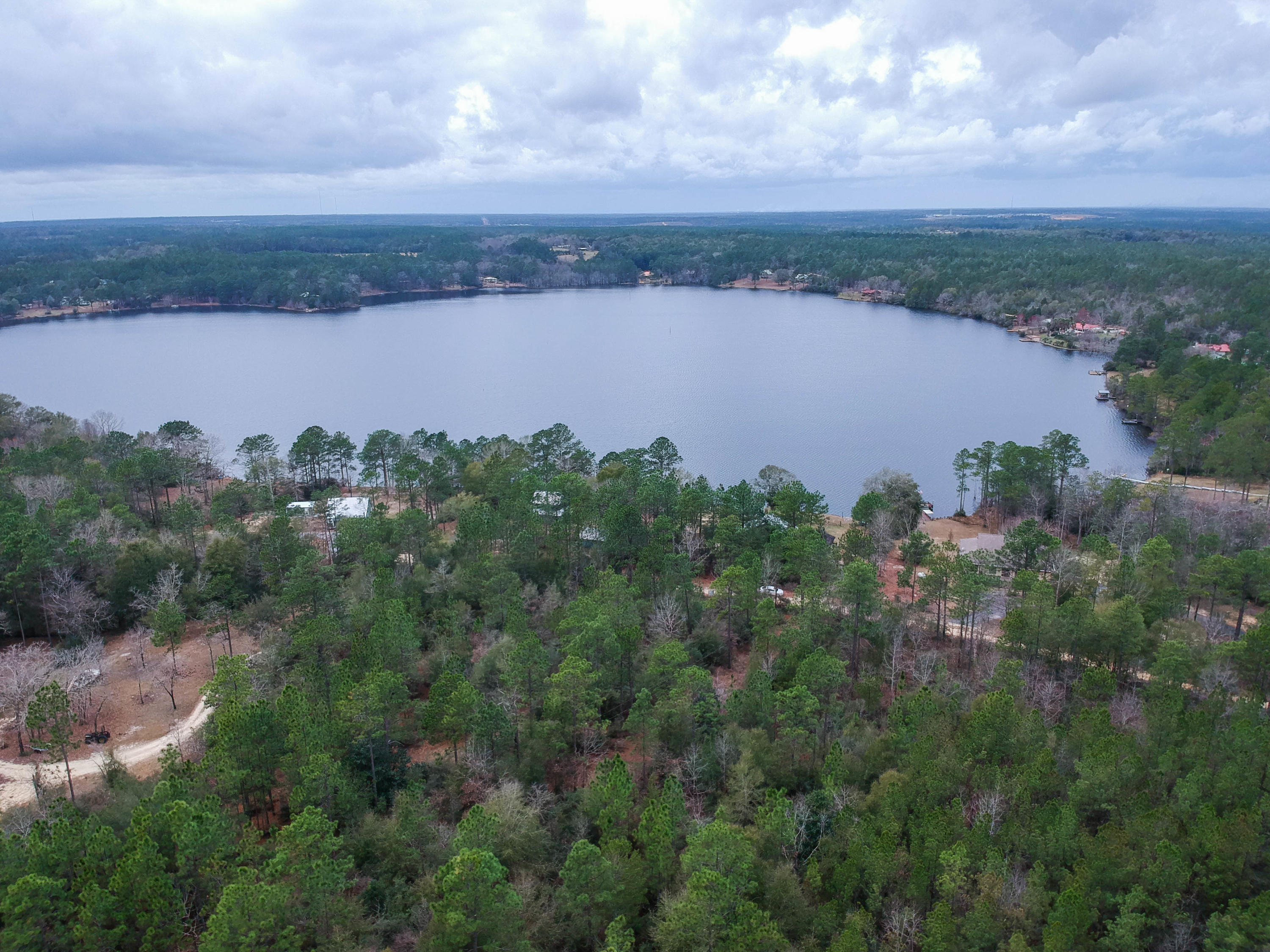 0 Spring Lake Road DeFuniak Springs, FL 32433 - Photo 4 of 16 an aerial view of a city and lake view
