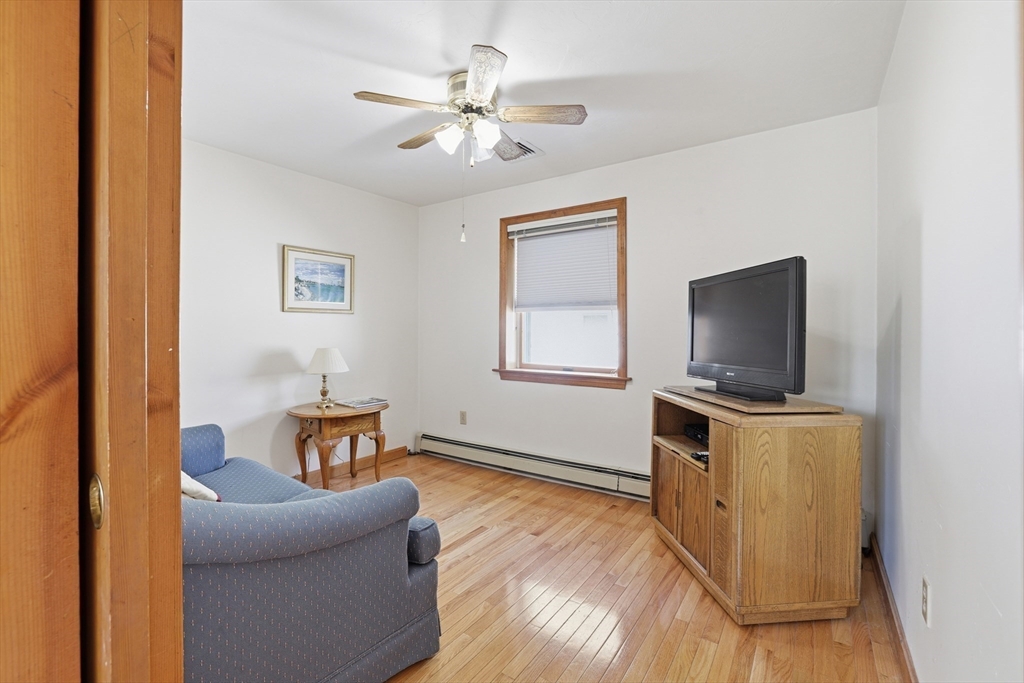 7 Swift Avenue Wareham, MA 02571 - Photo 13 of 42 a living room with furniture and a flat screen tv