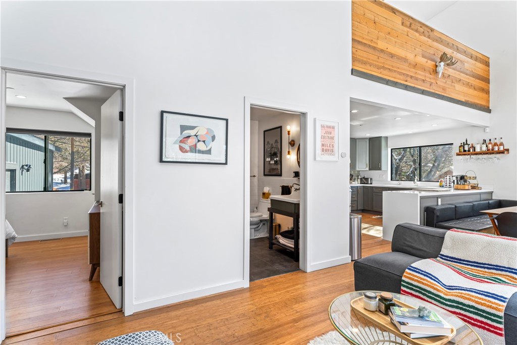 32945 Juniper Lane Green Valley Lake, CA 92341 - Photo 20 of 53 a living room with furniture and a wooden floor