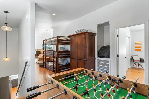 a kitchen with stainless steel appliances kitchen island granite countertop a refrigerator and a stove