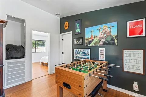 a bedroom with furniture and a bed