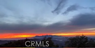 a view of a lake with a big yard