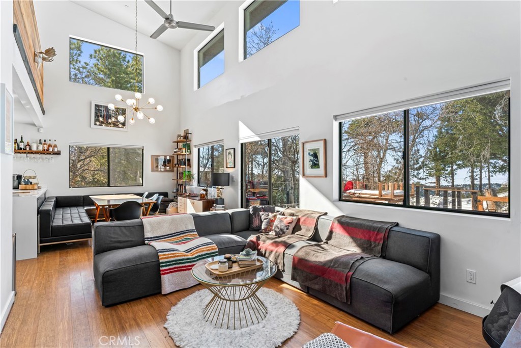 32945 Juniper Lane Green Valley Lake, CA 92341 - Photo 10 of 53 a living room with furniture and a large window