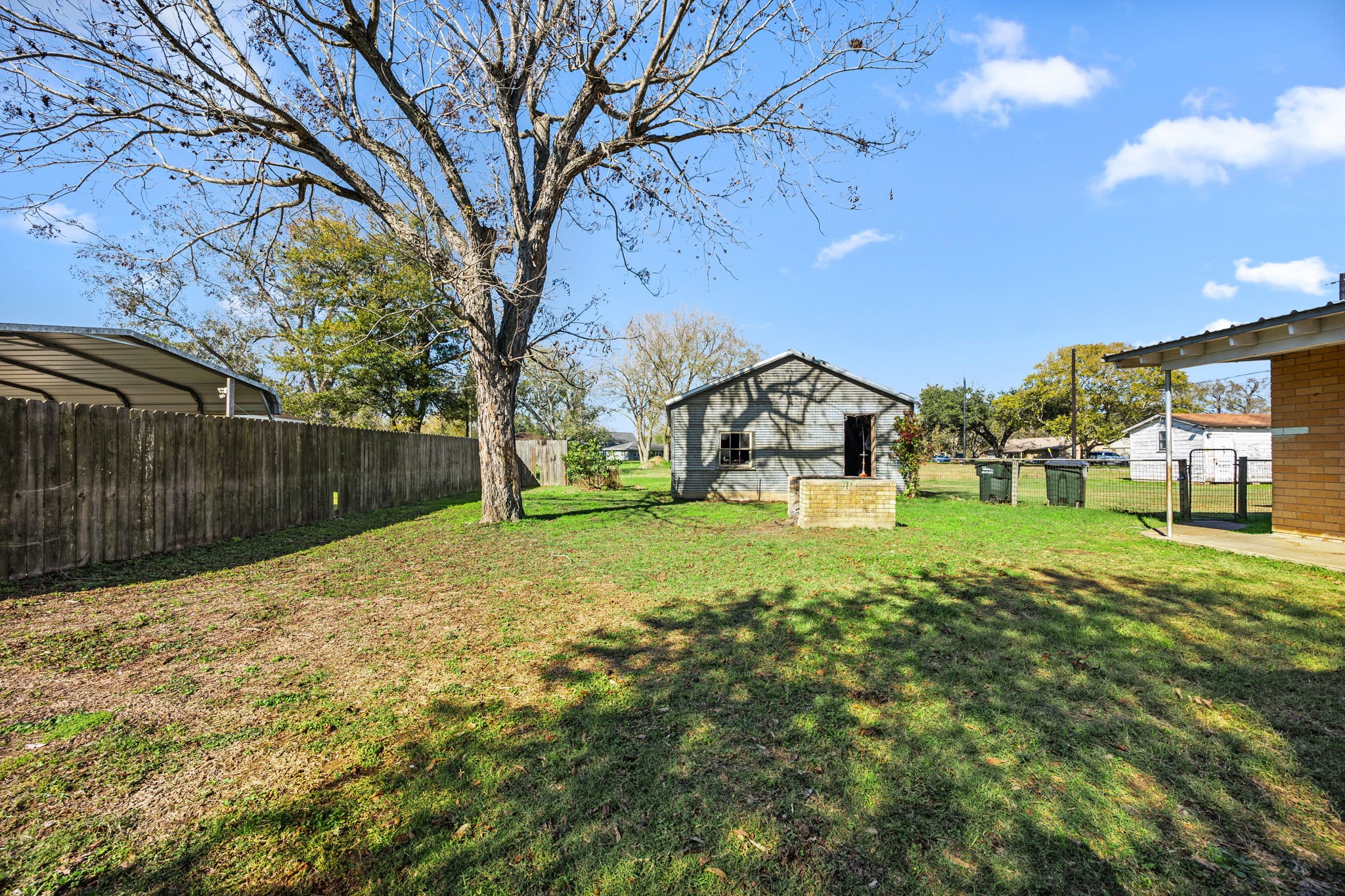 209 3rd Avenue Columbus, TX 78934 - Photo 31 of 34 a view of a park with large trees