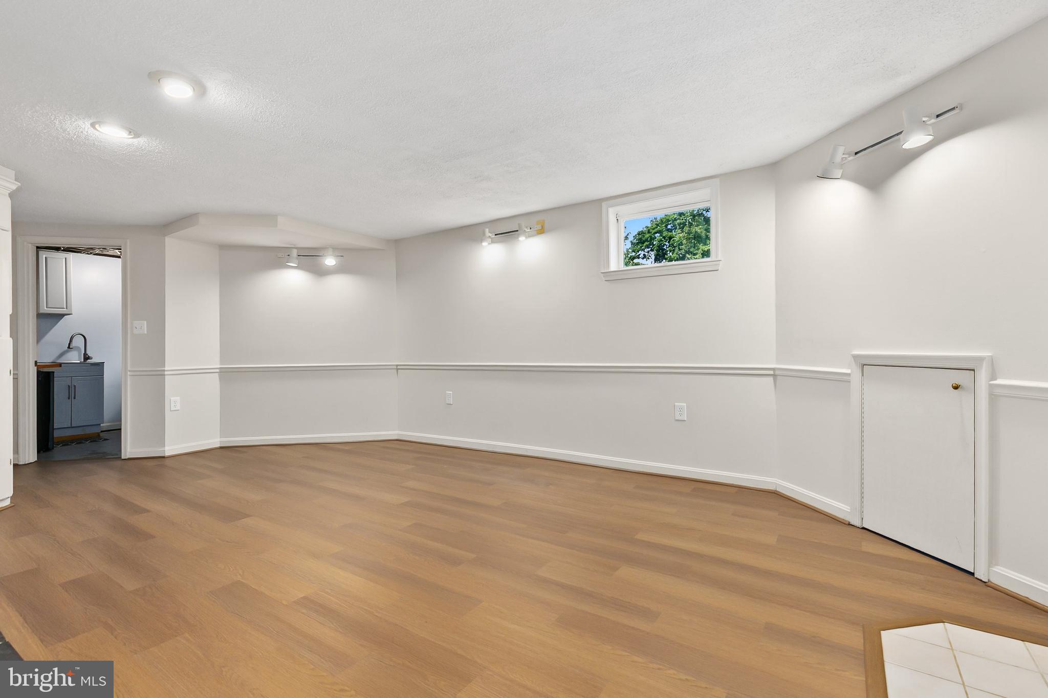 10601 Kinloch Road Silver Spring, MD 20903 - Photo 29 of 47 a view of an empty room