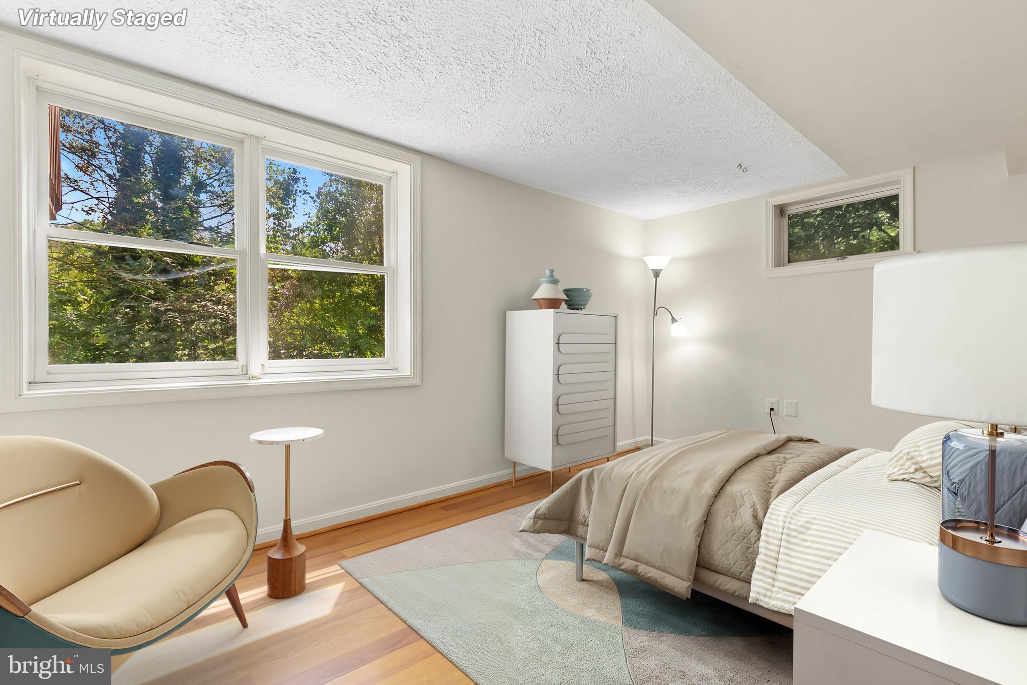 10601 Kinloch Road Silver Spring, MD 20903 - Photo 30 of 47 a bedroom with bed and a window