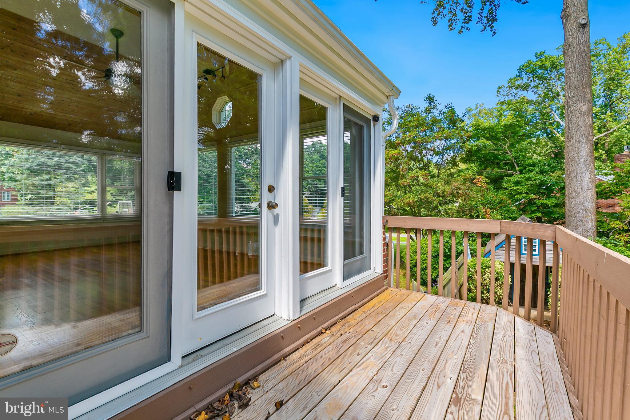 10601 Kinloch Road Silver Spring, MD 20903 - Photo 35 of 47 a view of balcony with wooden floor