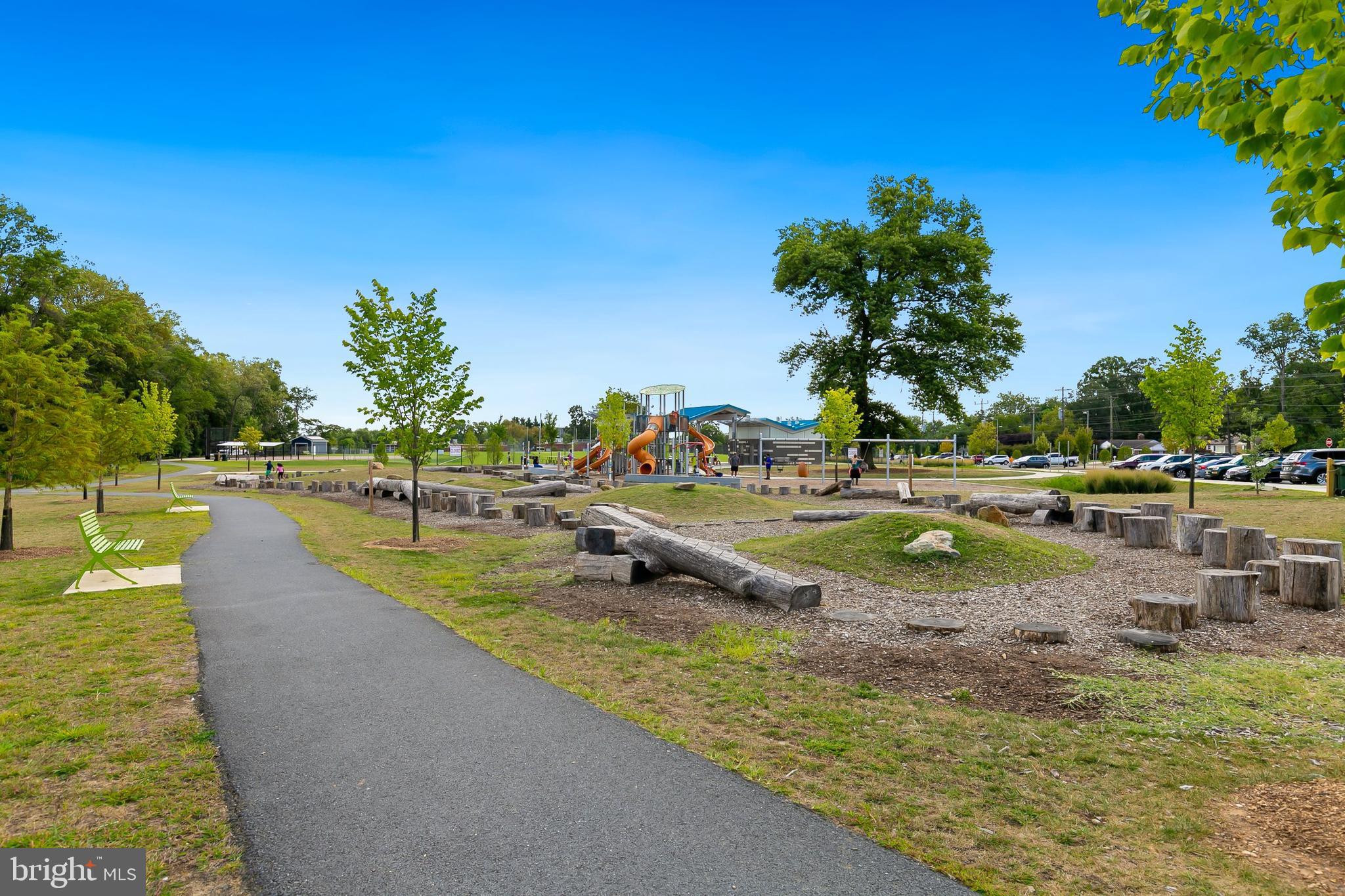 10601 Kinloch Road Silver Spring, MD 20903 - Photo 43 of 47 a view of a swimming pool with a lawn chairs