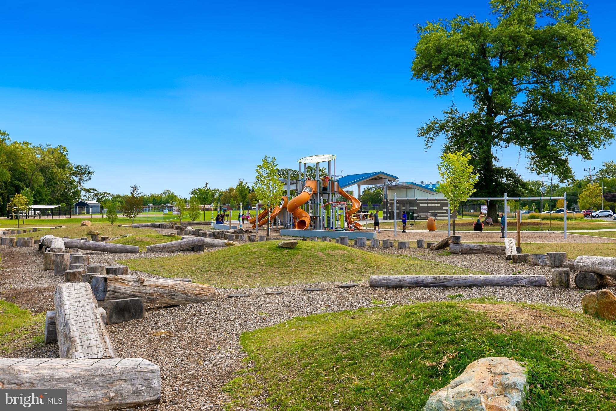 10601 Kinloch Road Silver Spring, MD 20903 - Photo 44 of 47 a view of a park with swings and slides