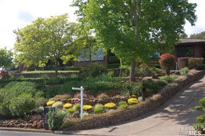 1713 Happy Valley Road Santa Rosa, CA 95404 - Photo 1 of 1 a view of a lake from a yard