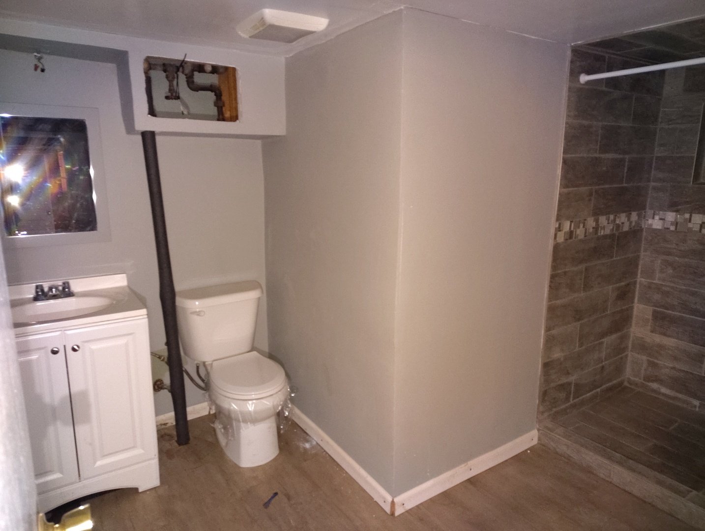 5541 West Grace Street Chicago, IL 60641 - Photo 17 of 26 a bathroom with a toilet and a shower