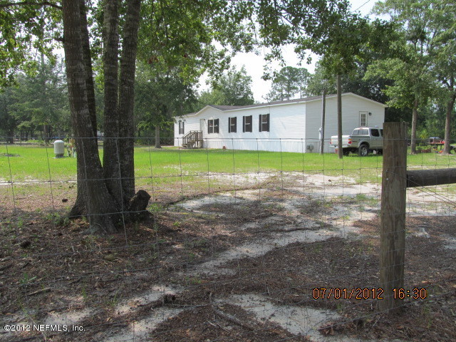 4994 Bent Twig Road Middleburg, FL 32068 - Photo 3 of 99 FRONT VIEW FROM CORNER OF DRIVEWAY