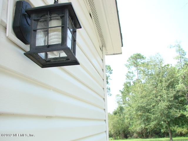 4994 Bent Twig Road Middleburg, FL 32068 - Photo 8 of 99 SIDE ENTRANCE ELECTRICAL FIXTURE