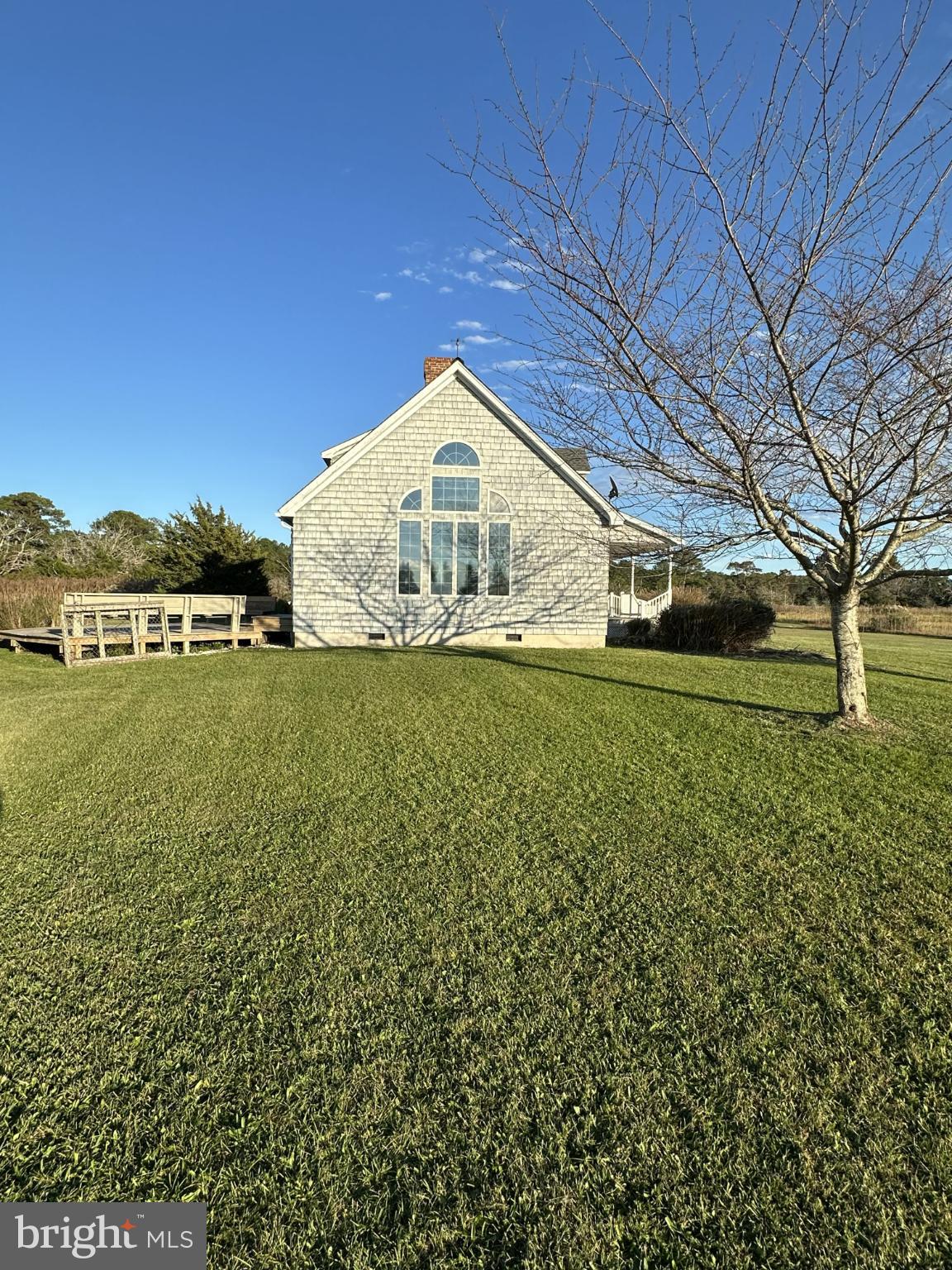 10148 Champ Road Princess Anne, MD 21853 - Photo 15 of 16 Charming home with expansive green lawn.