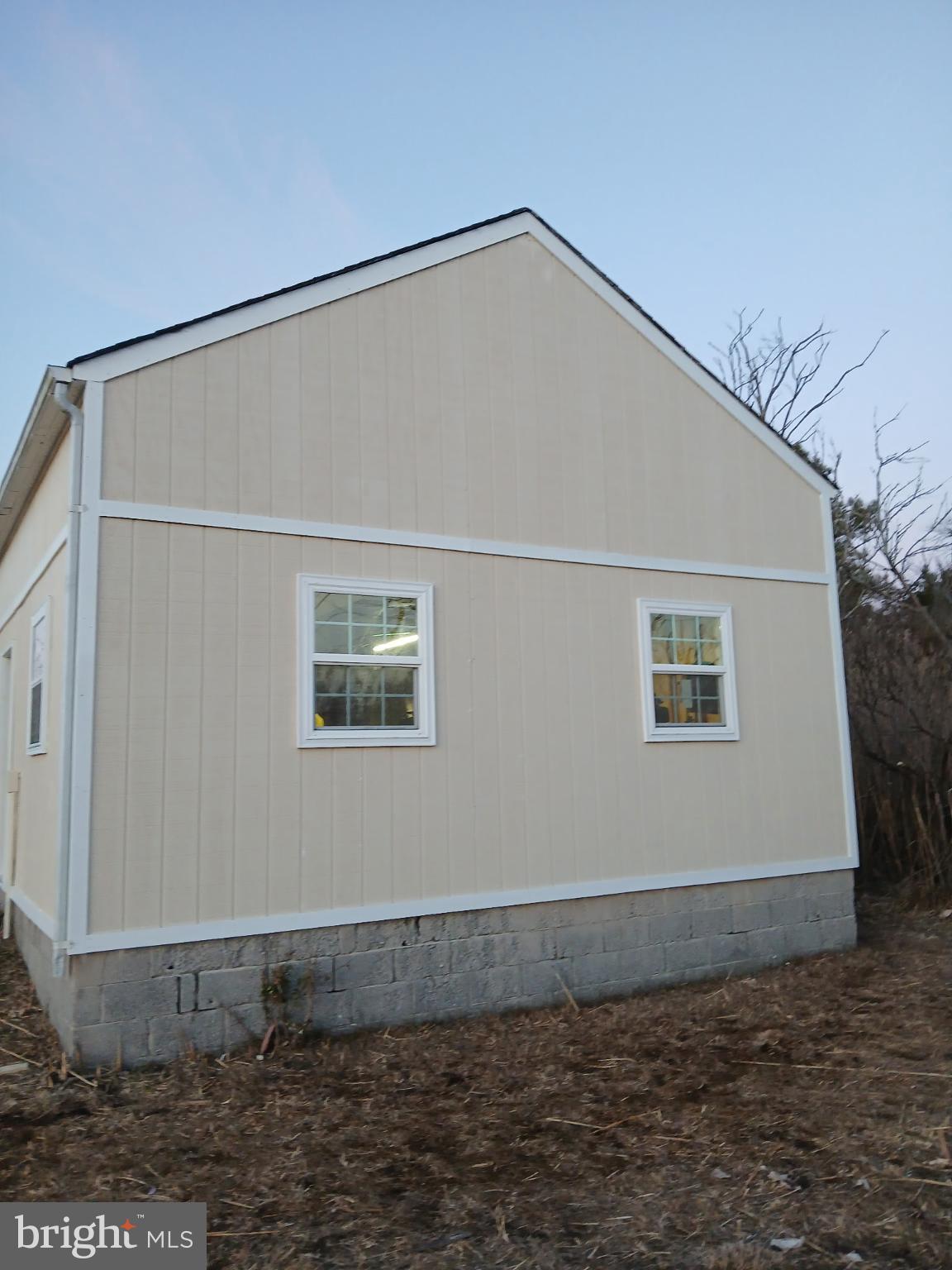 10148 Champ Road Princess Anne, MD 21853 - Photo 16 of 16 Detached barn/garage with lots of storage up/down.