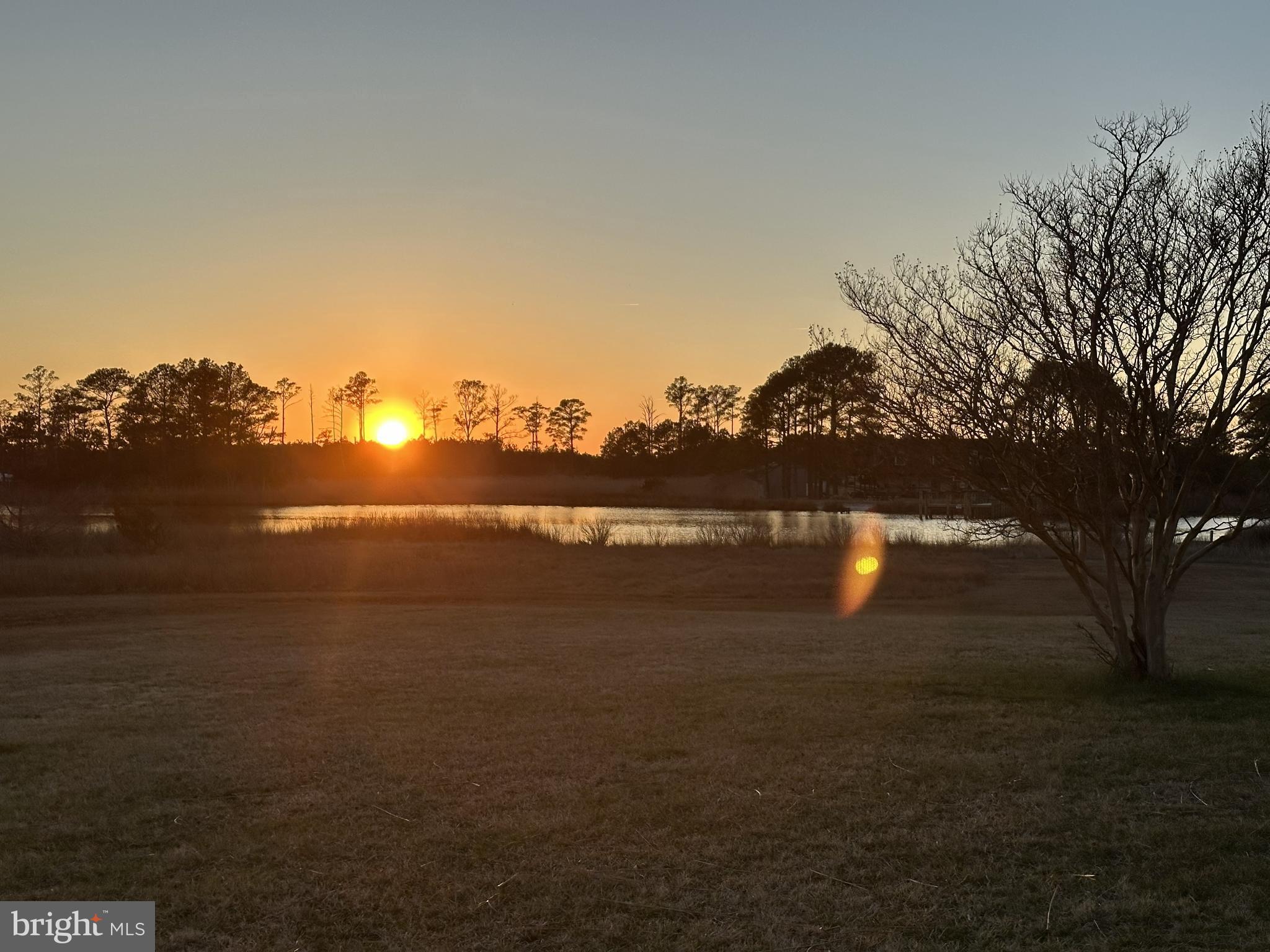10148 Champ Road Princess Anne, MD 21853 - Photo 10 of 16 Serene sunset over tranquil waters.