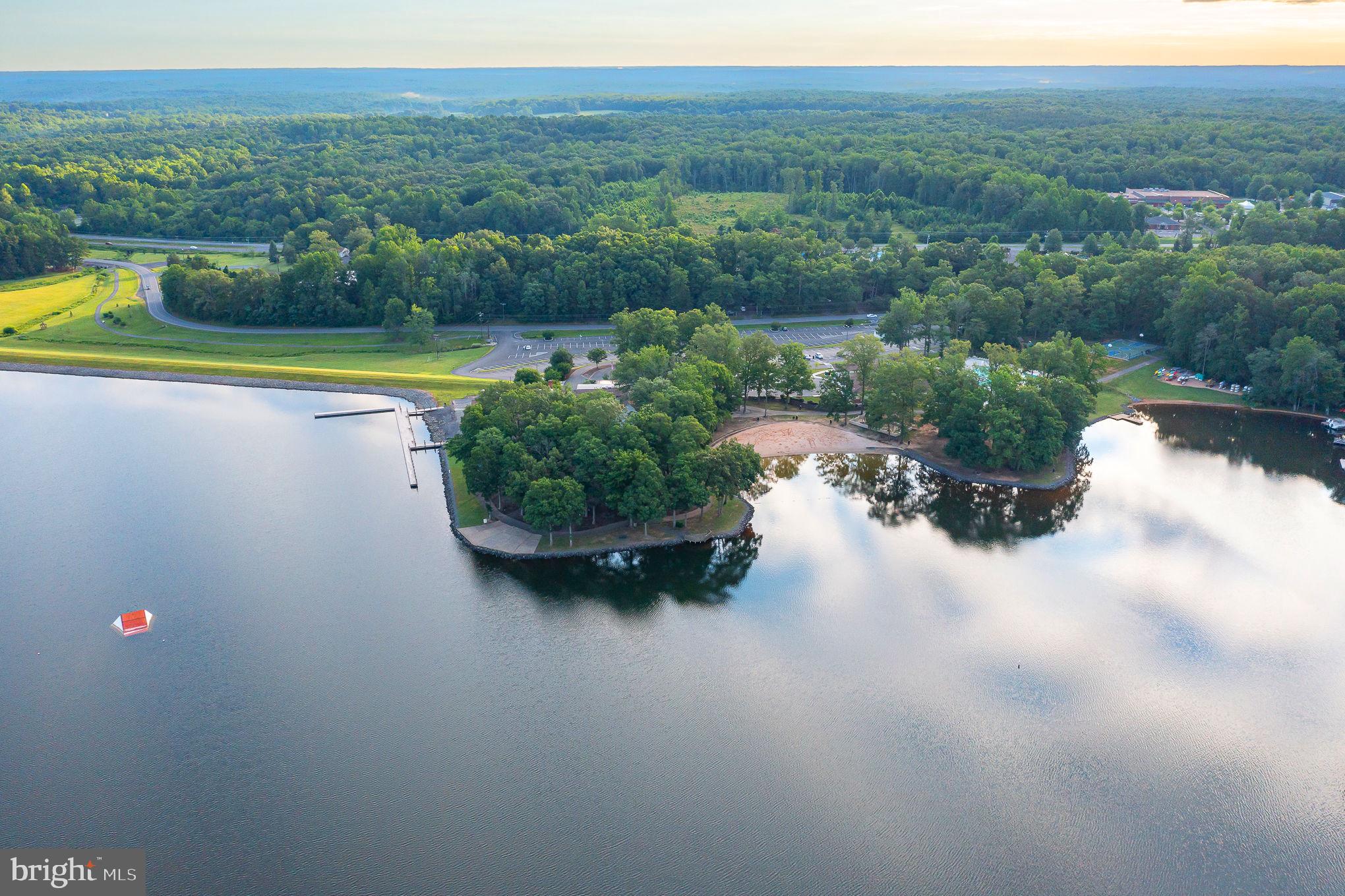 111 Chesterfield Court Locust Grove, VA 22508 - Photo 72 of 97 a view of a lake with a city