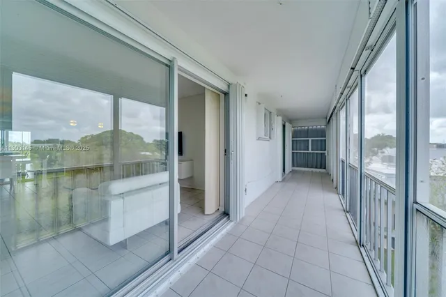 a view of a hallway with a shower