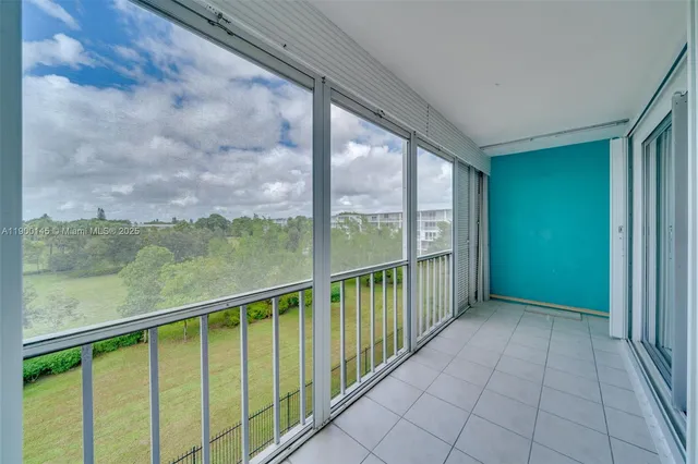 a view of a golf course with a lake