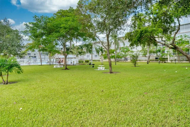 a view of a house with a swimming pool