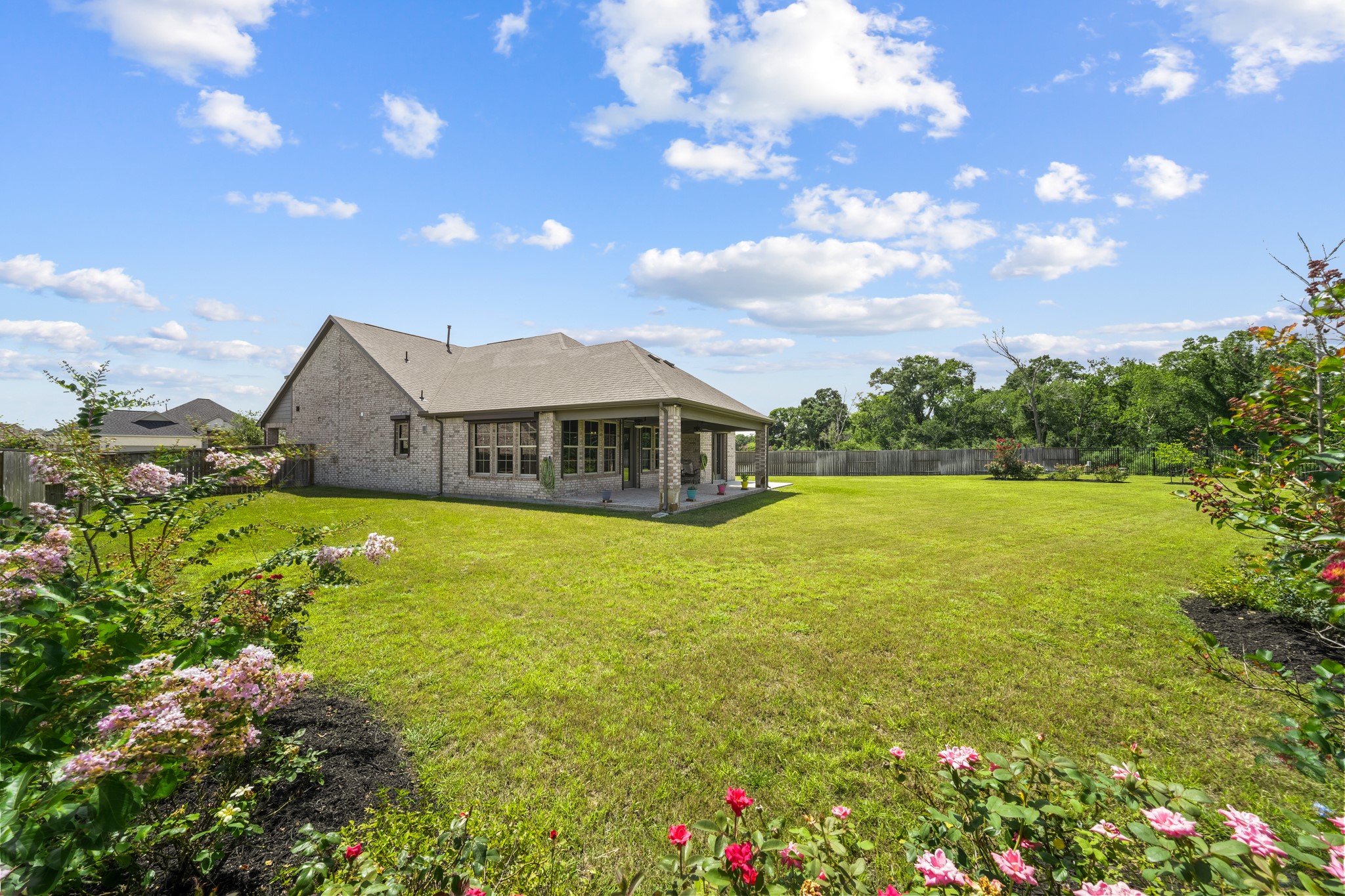 5739 Bobwhite Trail Manvel, TX 77578 - Photo 25 of 29 Enjoy the luxury of an oversized homesite with plenty of open green space to spread out. The generous yard provides exceptional privacy and room to enjoy every season.