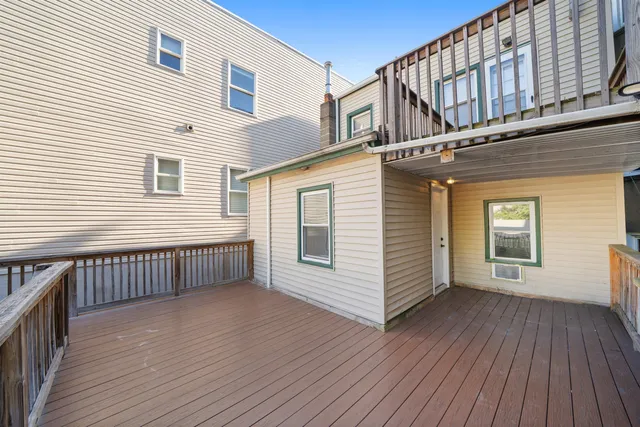 a view of a house with a deck