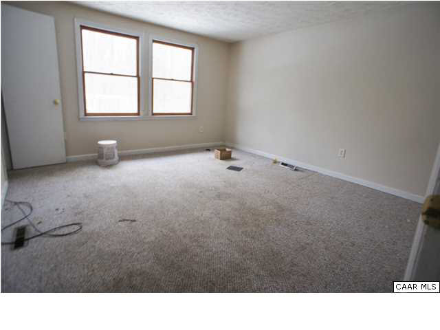 4608 Venable Road Kents Store, VA 23084 - Photo 15 of 18 a bathroom with a sink toilet and window