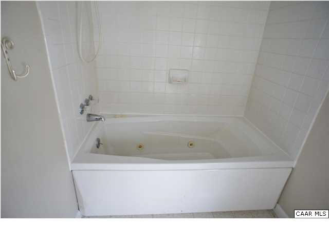 4608 Venable Road Kents Store, VA 23084 - Photo 7 of 18 a bathroom with a bathtub