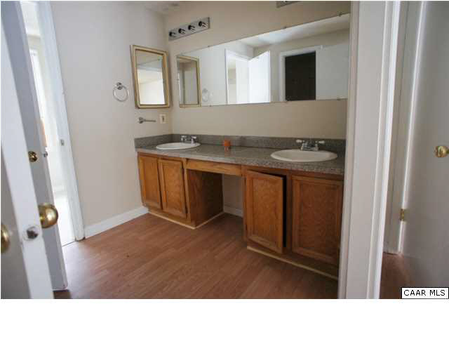 4608 Venable Road Kents Store, VA 23084 - Photo 8 of 18 a bathroom with a sink and a mirror