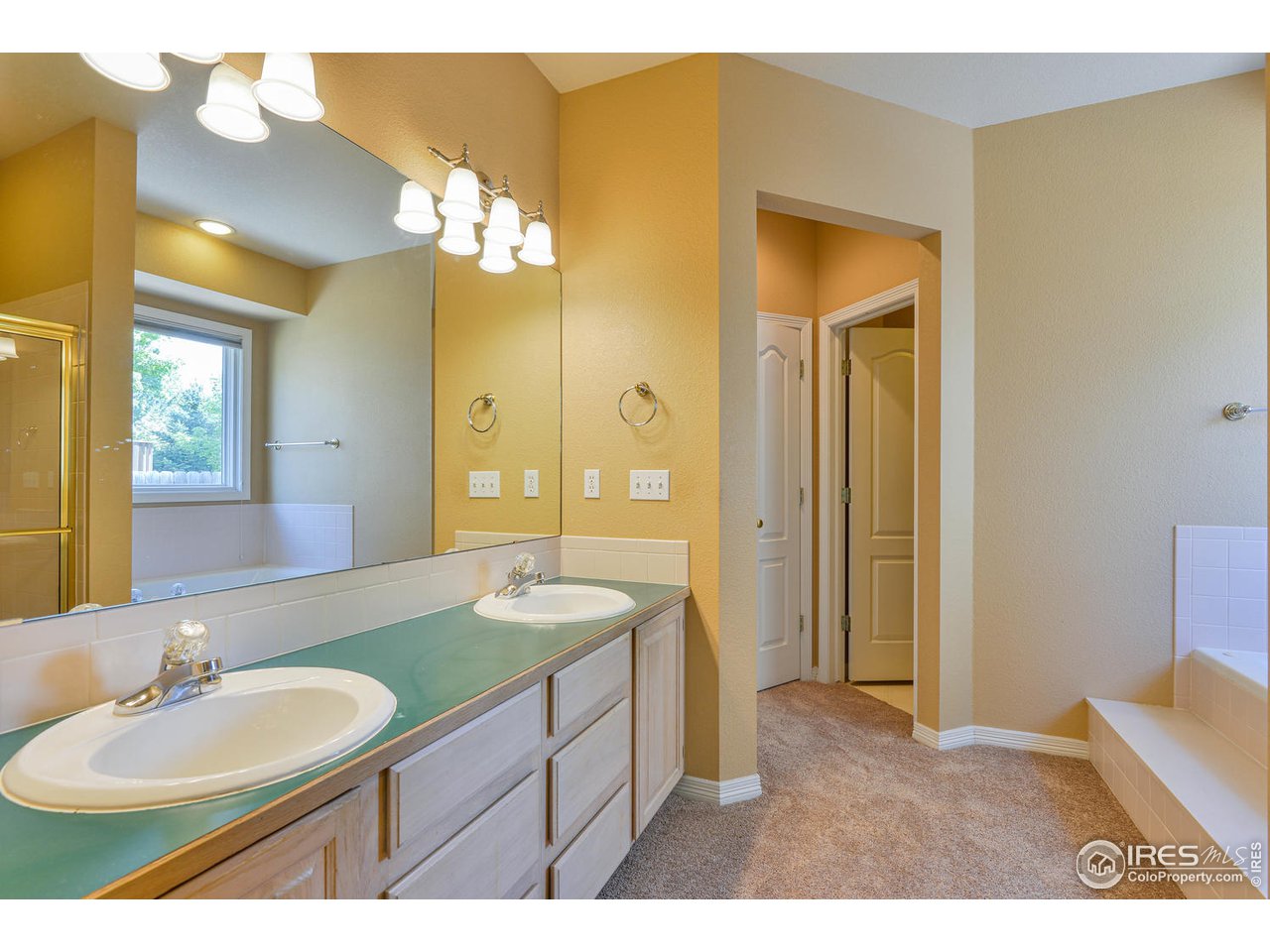 6300 Victoria Road Fort Collins, CO 80525 - Photo 17 of 28 Master vanity to tub