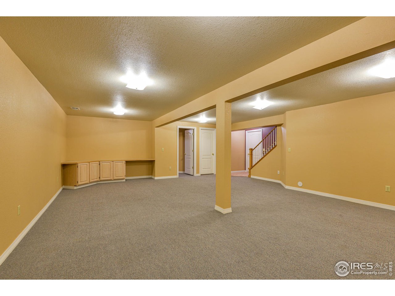 6300 Victoria Road Fort Collins, CO 80525 - Photo 25 of 28 Rec room to bedroom and stairs