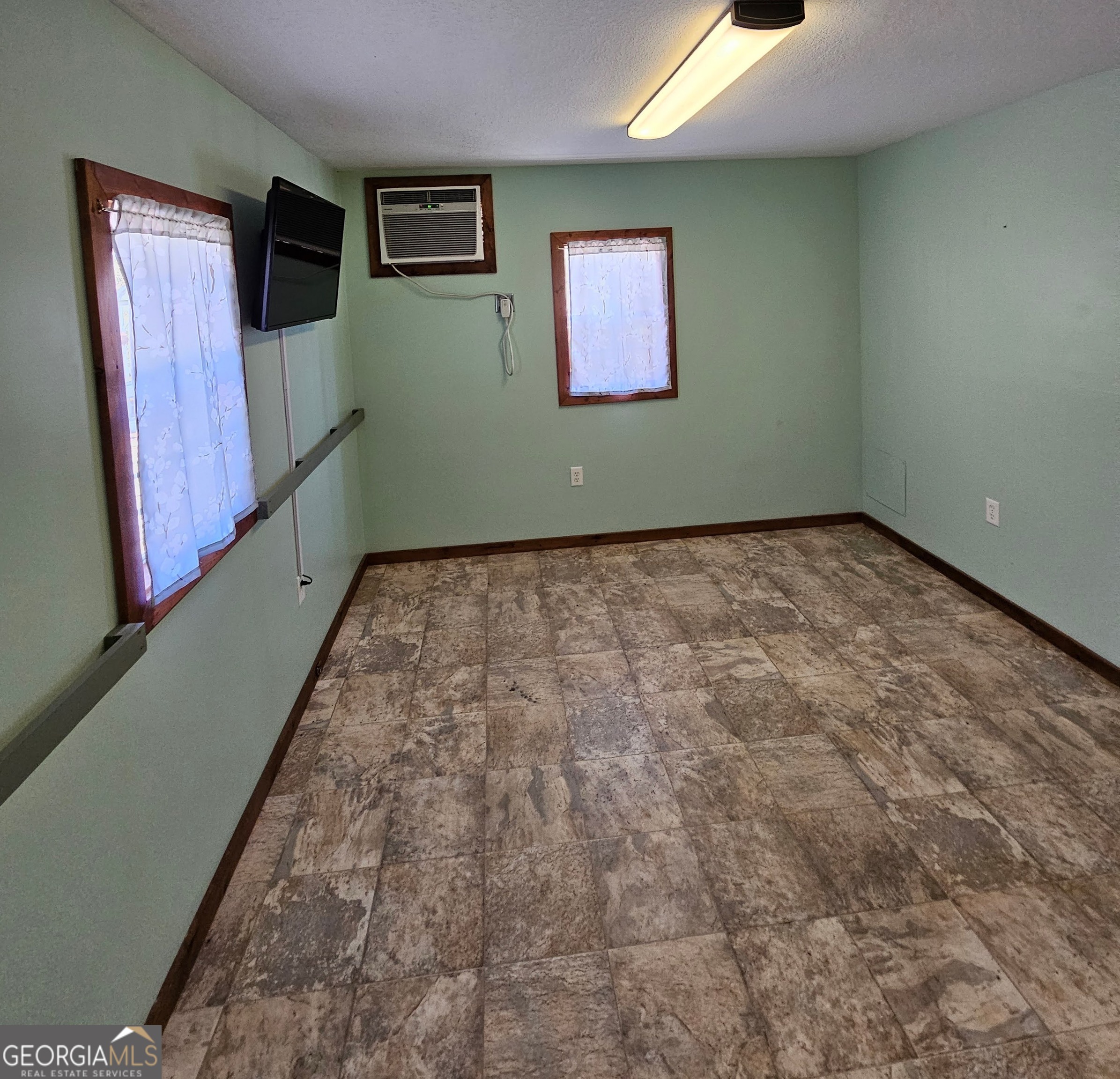 2262 Carter Bight Landing Road Surrency, GA 31563 - Photo 13 of 18 a view of an empty room and window