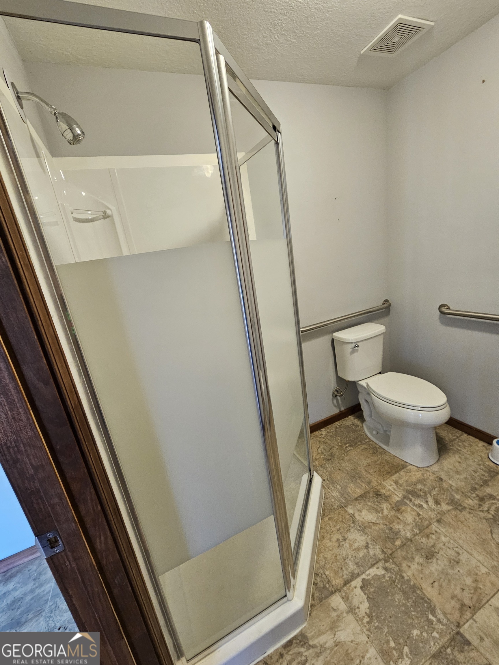 2262 Carter Bight Landing Road Surrency, GA 31563 - Photo 14 of 18 a bathroom with a sink and a toilet