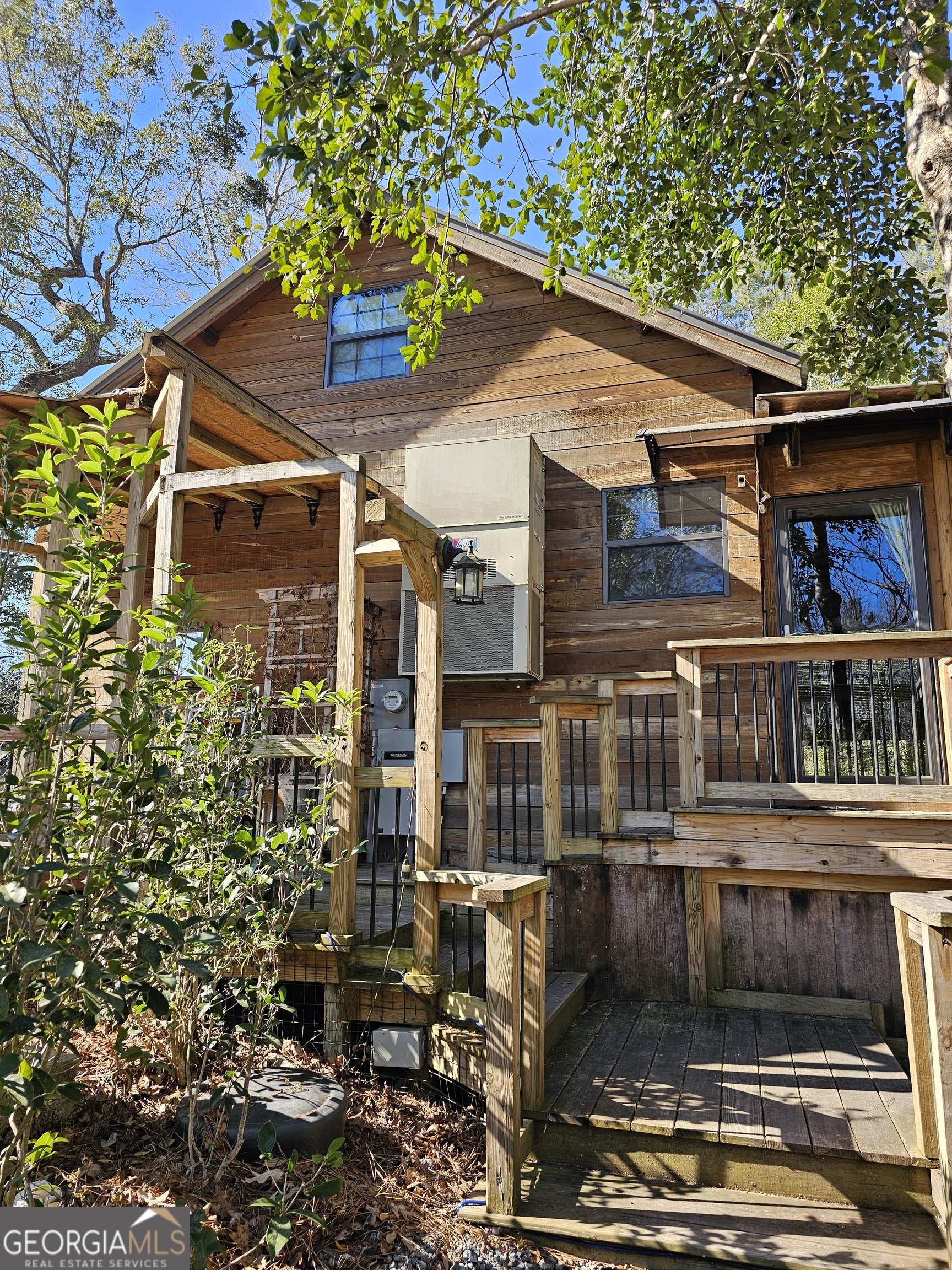 2262 Carter Bight Landing Road Surrency, GA 31563 - Photo 2 of 18 a view of a house with a small yard