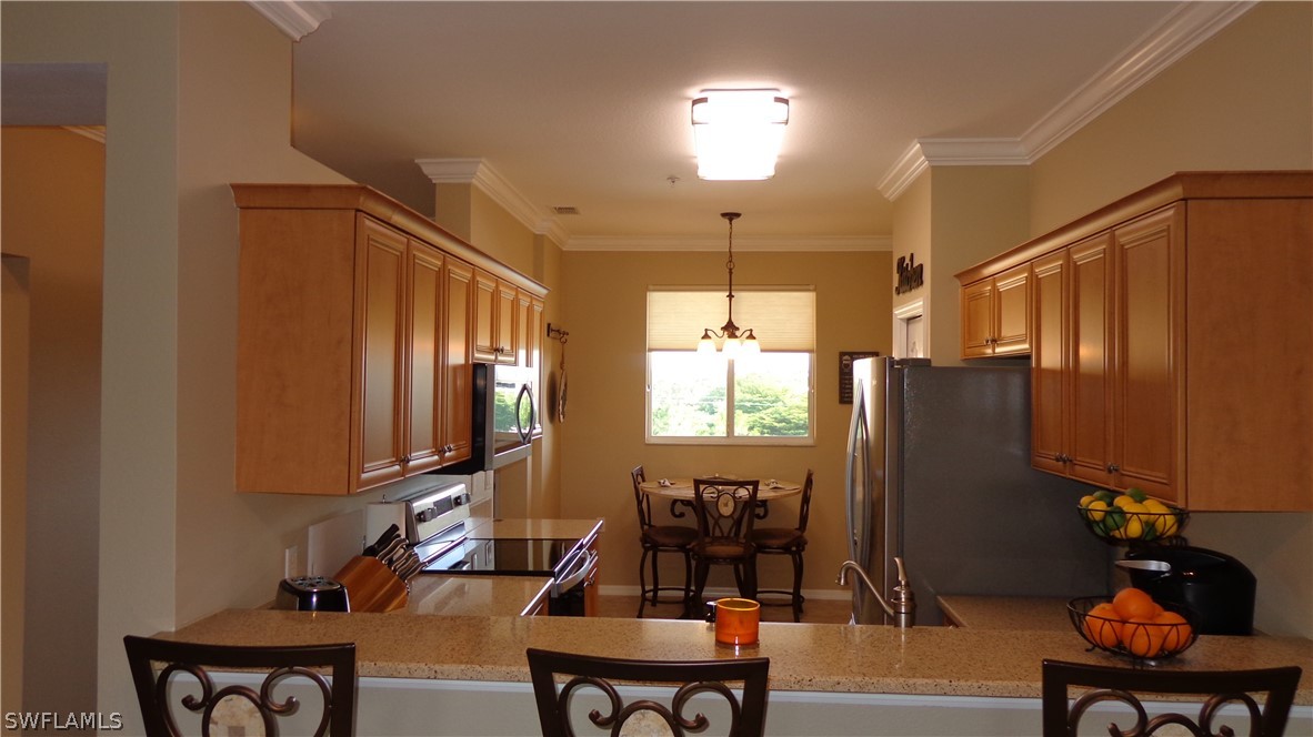 8261 Pathfinder Loop, Unit 745 Fort Myers, FL 33919 - Photo 5 of 20 a view of a livingroom with furniture and a window