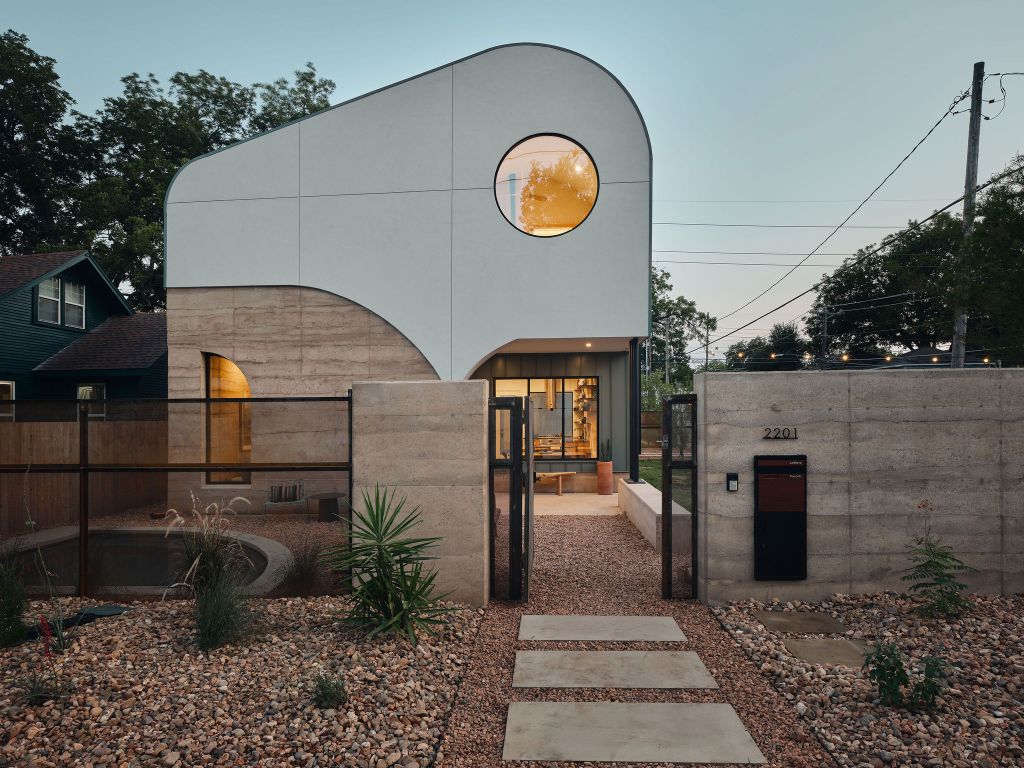a view of a parking space in backyard