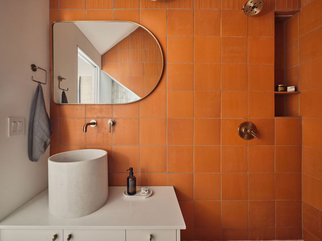 2201 Garden Street Austin, TX 78702 - Photo 14 of 40 a bathroom with a sink toilet and shower