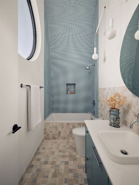 2201 Garden Street Austin, TX 78702 - Photo 26 of 40 a bathroom with a sink a toilet and shower