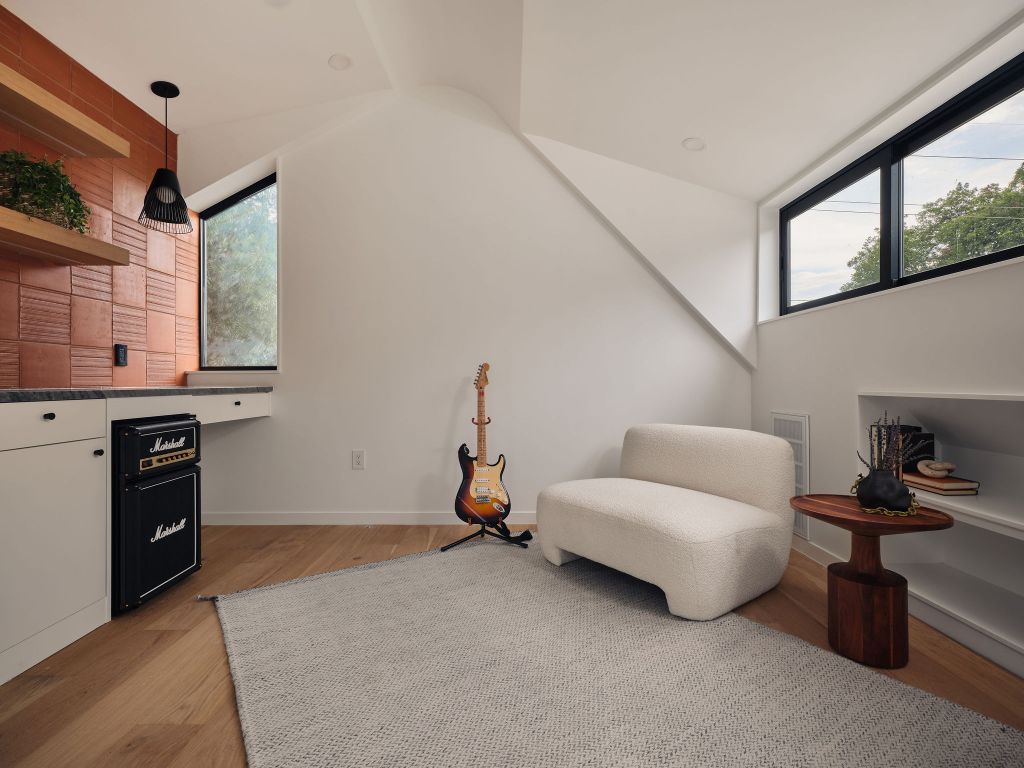 2201 Garden Street Austin, TX 78702 - Photo 30 of 40 a bedroom with furniture and windows