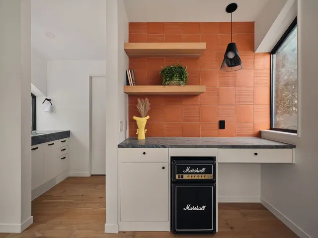 a view of a refrigerator and window