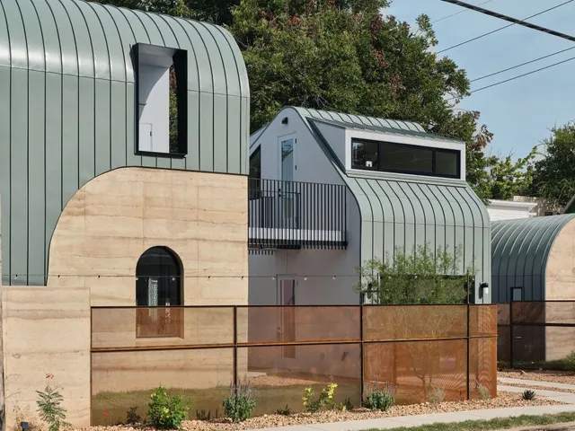 a front view of a house with a garage
