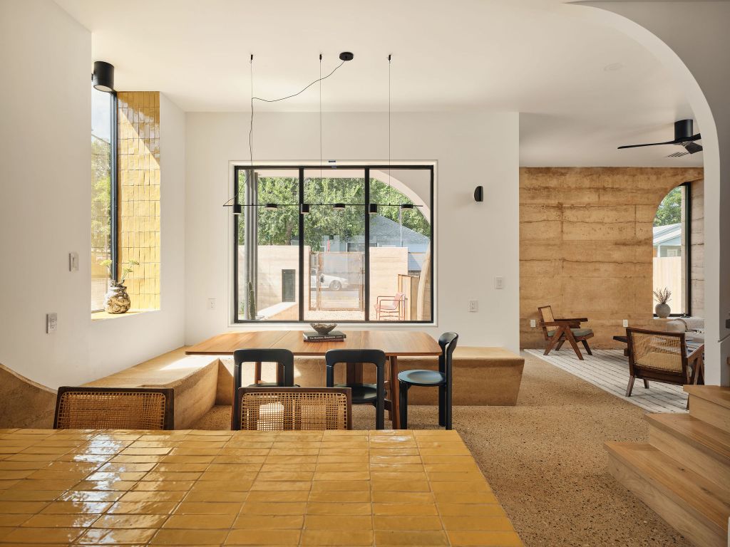 2201 Garden Street Austin, TX 78702 - Photo 6 of 40 a living room with furniture and large windows