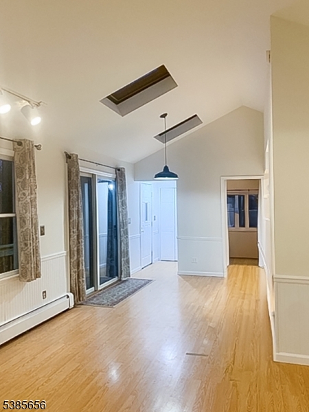5 Geneva Trail Hopatcong, NJ 07843 - Photo 4 of 9 a view of a livingroom with wooden floor and a ceiling fan