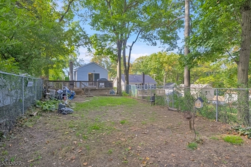 5 Geneva Trail Hopatcong, NJ 07843 - Photo 8 of 9 a house view with a backyard space