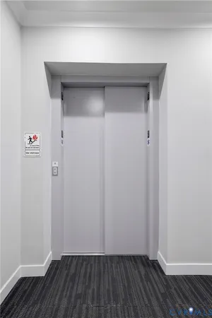 a view of small space with wooden floor