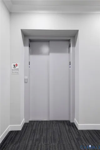 a view of small space with wooden floor