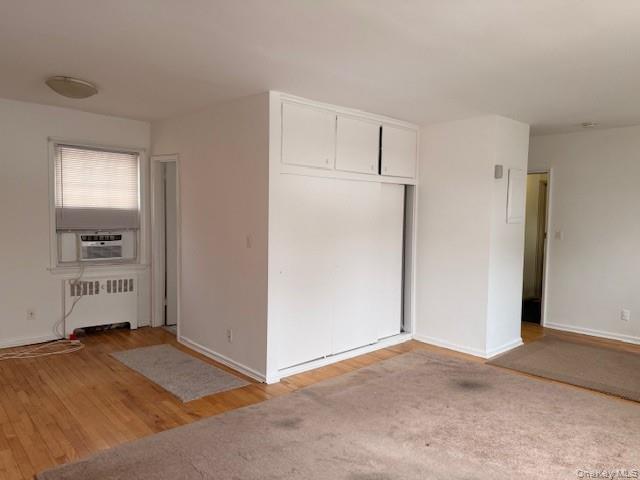 180 Pinewood Road, Unit 10 Hartsdale, NY 10530 - Photo 5 of 16 View of living space showing closets and entrance to bath