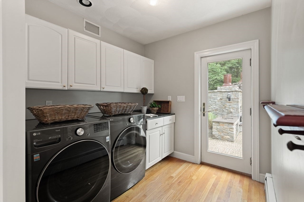 9 Mohawk Lane Lynnfield, MA 01940 - Photo 27 of 42 a view of a kitchen with washer and dryer