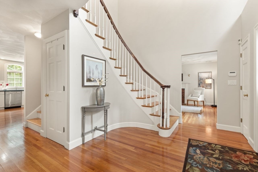 9 Mohawk Lane Lynnfield, MA 01940 - Photo 8 of 42 a view of entryway and hall with wooden floor